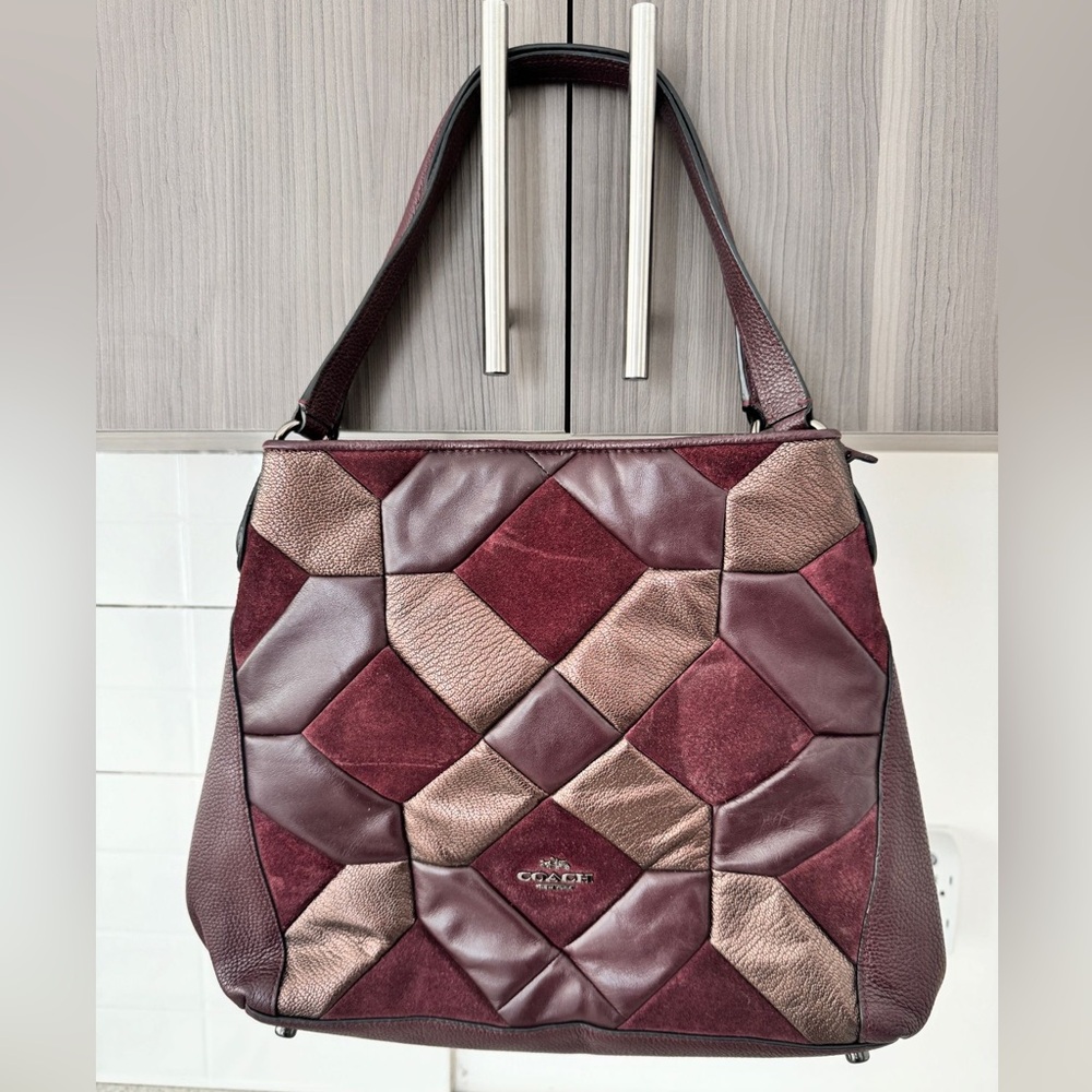 Previously loved COACH leather hobo bag